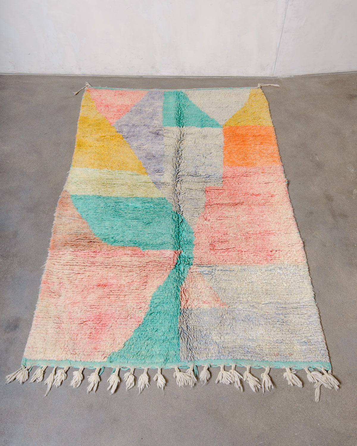 Modern, designer, handcrafted Berber rug from Morocco. Vintage carpet with beautiful colours and patterns and fluffy texture.